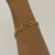 PULSEIRA ELOS REDONDOS DOURADO - comprar online