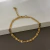 PULSEIRA LACRE DETALHADO DOURADO na internet