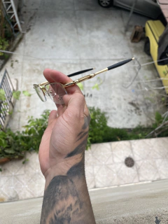 Lupa de mola armação dourada - comprar online