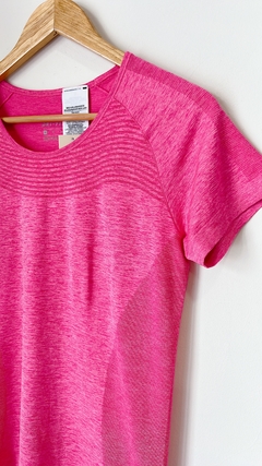 9771 Remera Nike Fucsia TM en internet