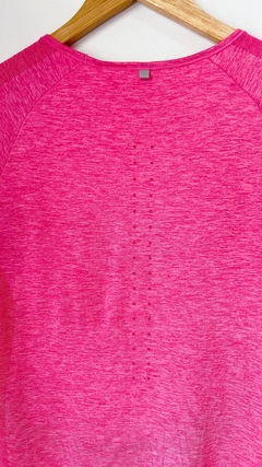 Imagen de 9771 Remera Nike Fucsia TM