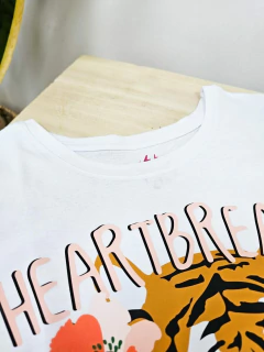 REMERA RISE (RE0058) en internet