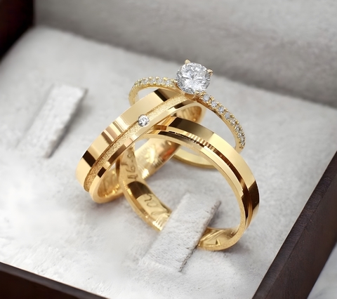 Par de alianças canoa + Anel solitário