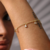 Pulseira Bolinhas com Zirconia Pendurada Dourada - comprar online