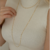 Colar Longo Coração Mini Dourado - comprar online