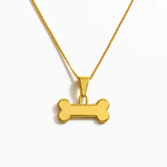 Colar Ossinho de Cachorro Dourado - comprar online