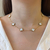 Colar 7 trevos branco tradicional - aço inoxidavel ouro 18k - comprar online
