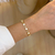 Imagem do Pulseira cravejada e madre pérola - ouro18k