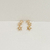 Brinco Três Estrelas Zirconia Dourado