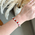 Bracelete trevos vermelho - aço inoxidavel na internet