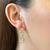 Brinco tres cristais - ouro18k na internet