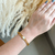 Imagem do Bracelete elos com trevo branco - aço inoxidável ouro18k