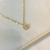 Imagem do Colar ponto de luz oval - ouro18k.