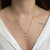 Colar trevo com ponto de luz branco- aço inoxidavel ouro18k - loja online