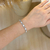 Pulseira cravejada e madre pérola - ouro branco