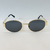 Oculos celine oval preto com dourado