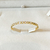 Bracelete cravejado geometrico aberto - ouro18K na internet