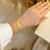 Pulseira Plaquinha Personalizada Elo Português Dourada - comprar online