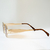 Oculos celine oval marrom com dourado na internet