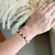 Bracelete trevos vermelho - aço inoxidavel - comprar online