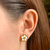 Brinco flor branca - aço inoxidavel ouro18k - comprar online