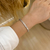 Bracelete cravejado geometrico aberto - ouro branco - comprar online
