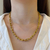 Colar elos tiff - aço inoxidavel ouro18k - comprar online