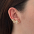 Brinco Três Estrelas Zirconia Dourado - comprar online