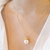 Colar Perola Shell Cravejada Dourado