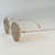 Oculos gold dourado, lente marrom claro. na internet