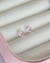 Brinco rosa bebê