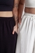 calça pantalona com fenda setti