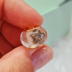 Berloques com implantes