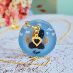 Pingente patinha com pelinhos (Corrente não inclusa) na internet