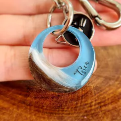 Chaveiro redondo vazado com pelinhos - comprar online