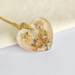 Pingente coração com pelinhos e cinzas - comprar online