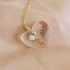 Pingente com Dente Tulipa Unitária na internet