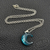 Collar Acero Quirúrgico Cielo con Nubes Encapsuladas en Luna - Brilla en la oscuridad - tienda online