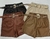 SHORT EM COURO RESINADO COM CINTO TACHINHAS_7081 na internet