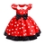 Vestido infantil vermelho com bolinhas brancas e laço preto, inspirado na Minnie Mouse.