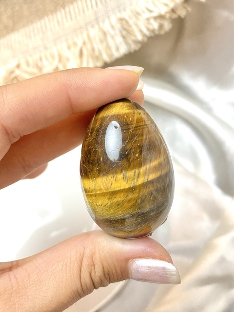 huevos de ojo de tigre (perforados)