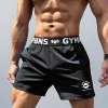 short preto de treino com faixa elástica e estampas na cintura