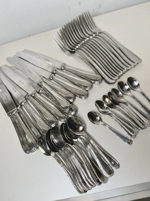 JUEGO DE CUBIERTOS PLATA LAPAS DE ACERO MODELO 990 48 PIEZAS $ 480000