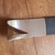 Ferramenta em aço inoxidável Modelo 04 (ponta "V" em curva) e cabo emborrachado para escultura e carving