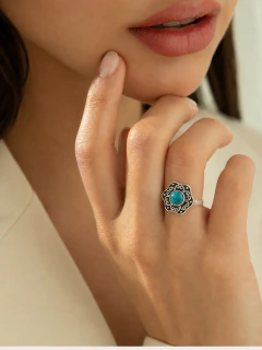 Anillo flor empavonada turquesa en internet