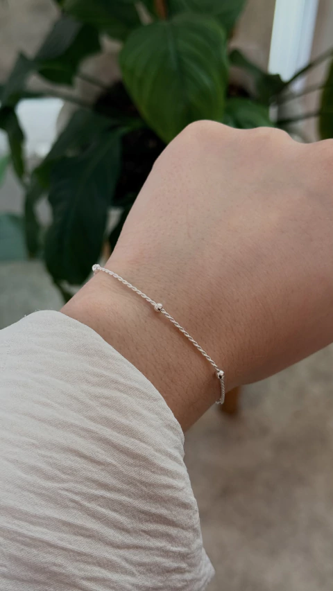 PULSERA TOURBILLON CON BOLITAS - comprar online