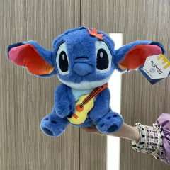 Imagem do DISNEY - PELÚCIA COM BOLSO E ALÇA LILO E STITCH 25 CM - VIOLÃO