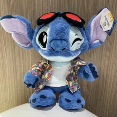 DISNEY - PELÚCIA COM BOLSO E ALÇA LILO E STITCH 30CM - CAMISA HAVAIANA - loja online