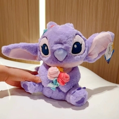 DISNEY - PELÚCIA COM BOLSO E ALÇA LILO E STITCH 25 CM - ANGEL - Mamu Kids Store