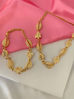 Conjunto peixe e conchas